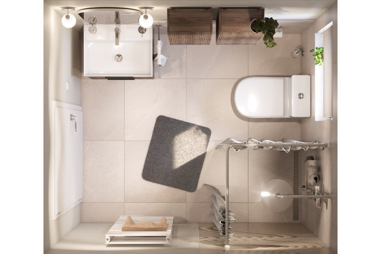 Vtáčia perspektíva kúpeľne s umývadlom, toaletou, kúrením a kúpeľňovou predložkou.