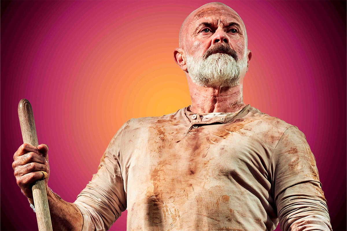 Portrét muža s briadkou držiaceho drevenú tyč