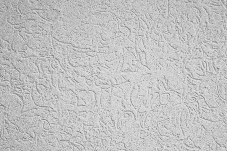 Detail steny so štukovou štruktúrou