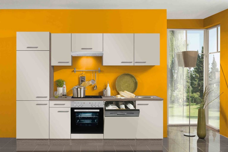 Kompletná kuchynská linka so skrinkami, drezom, sporákom, rúrou a umývačkou riadu pred farebnou stenou