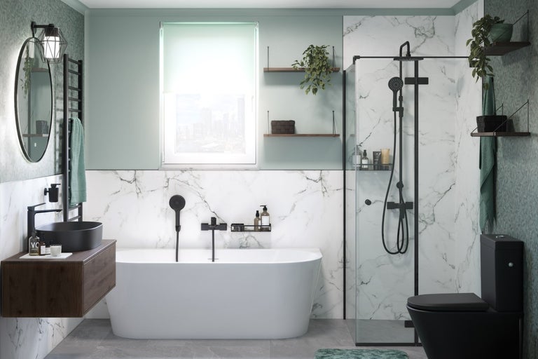 Kúpeľňa s vaňou, sprchou, umývadlom a toaletou vo svetlom a modernom dizajne