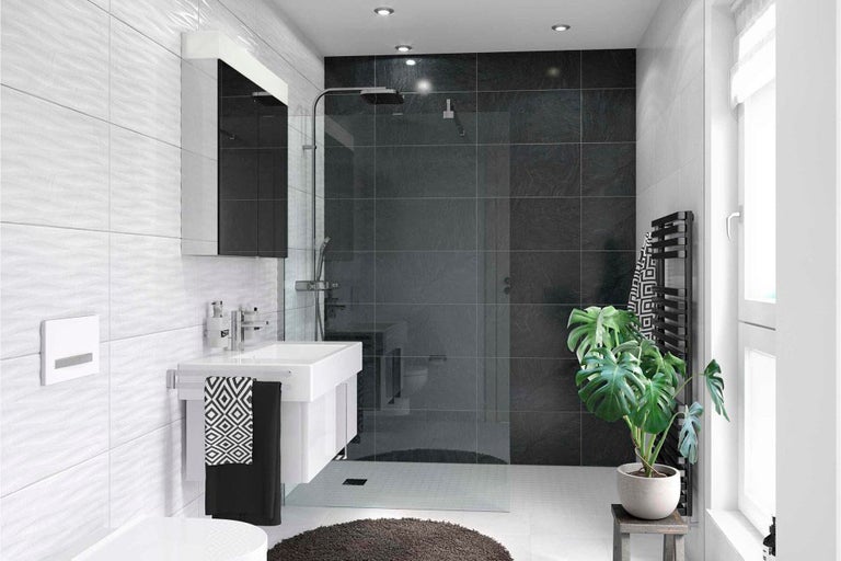 Moderná kúpeľňa so sprchou, umývadlom a sivými obkladmi