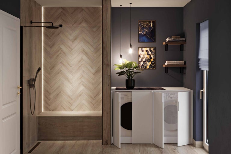 Moderná kúpeľňa so sprchou, práčkou a sušičkou pod pracovnou doskou