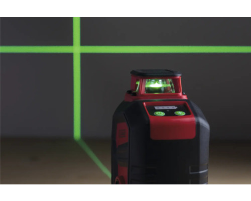 Červený a čierny rotačný laser premieta zelené laserové čiary.