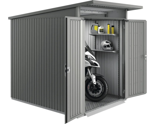 Kovová garáž pre motocykle s otvorenými dverami, motocyklom a policami