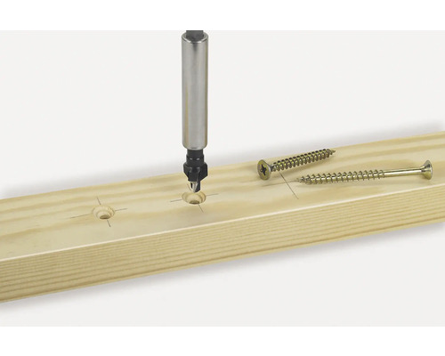 Drevená doska so záhlbníkom a skrutkami.