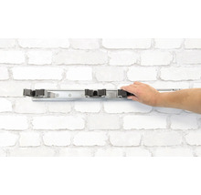 Nástenný držiak na násady s rukou