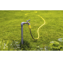 Záhrada s vodovodným kohútikom a záhradnou hadicou