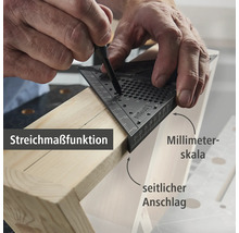 Osoba používa uholník na označenie čiary na kuse dreva