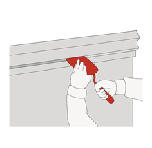 Ilustrácia osoby používajúcej špachtľu na škárovanie