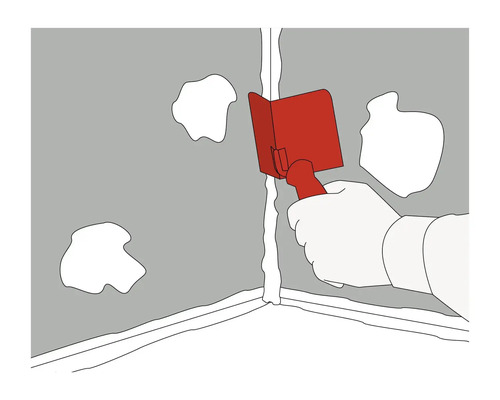 Použitie hladidla škár v rohu na vyhladenie tmelu