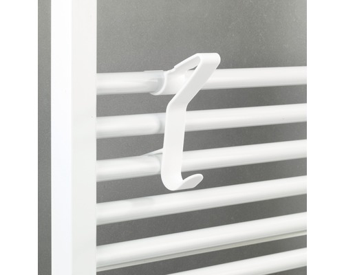 Plastový hák na uteráky na radiátore