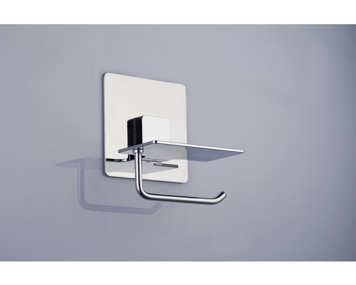 Kovový držiak toaletného papiera s poličkou