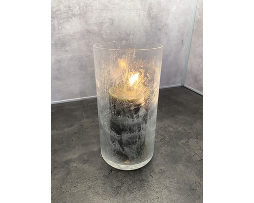 Sviečka v sklenenej lampáši