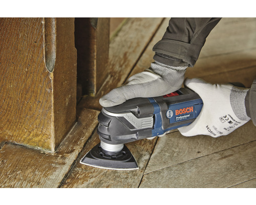 Multifunkčný nástroj používaný na drevenom povrchu