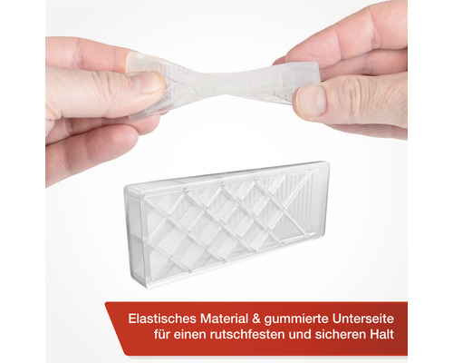 Priehľadný dverný doraz z elastického materiálu drží v rukách
