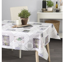 Jedálenský stôl so sivým vzorovaným obrusom, bylinkový vzor