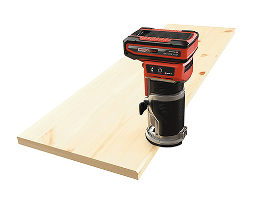 Akumulátorová horná fréza Einhell na drevenej doske