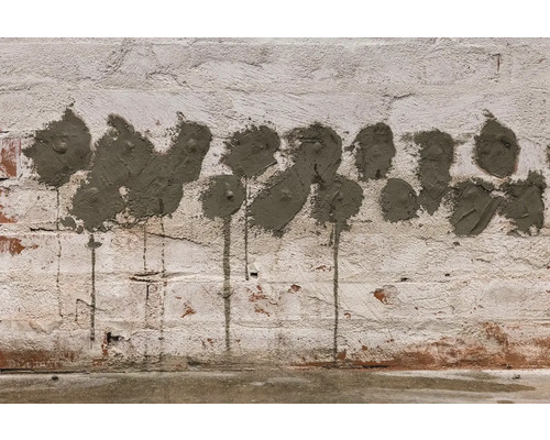 Opravená tehlová stena s maltou