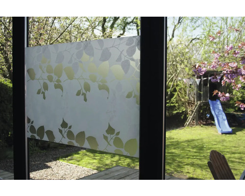 Oknenná fólia so vzorom listov na sklenenej tabuli