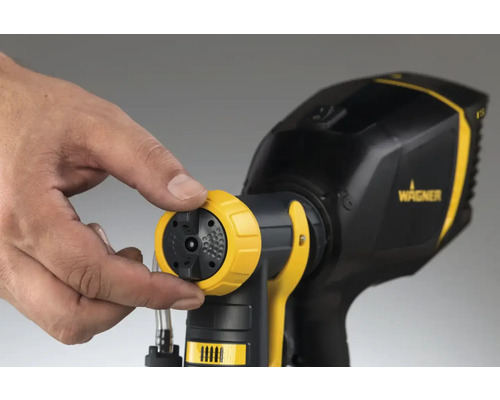 Striekací systém s nastaviteľnou tryskou v ruke