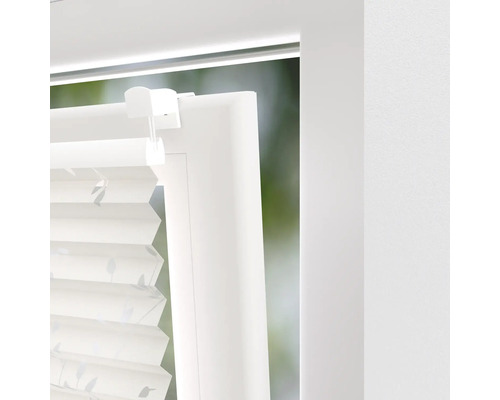 Detailný záber plisovanej žalúzie na okne