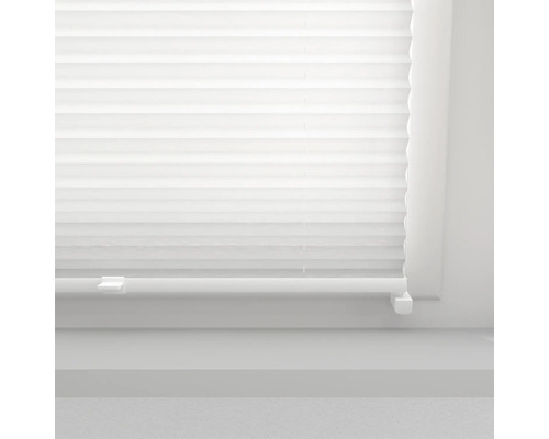 Detailný záber plisovanej žalúzie na okne