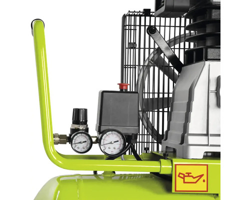 Detail kompresora s manometrami a symbolom oleja