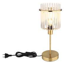 Stolná lampa s priehľadnými sklenenými tyčami a kovovou základňou