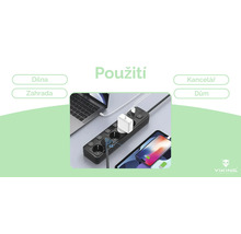 Predlžovací kábel s USB portami, pripojený k notebooku a smartfónu.