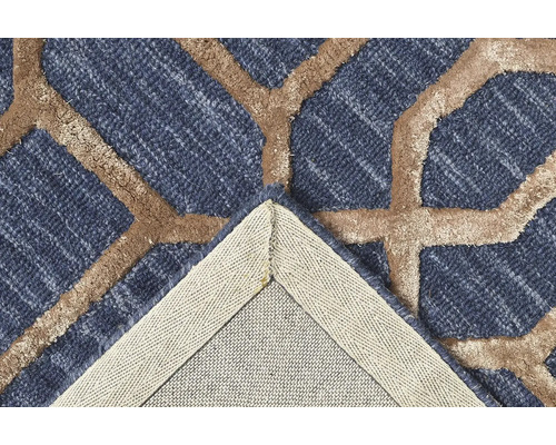 Detail koberca s geometrickým vzorom