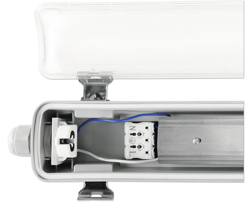 Vnútorný pohľad na trubicové žiarivkové svietidlo s otvoreným krytom na zobrazenie elektrických komponentov