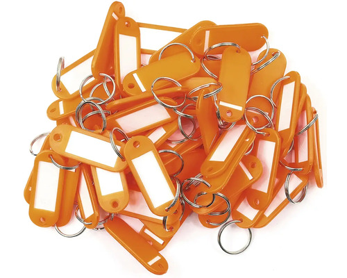 Hromada oranžových kľúčeniek s popisovacím poľom a krúžkom na kľúče