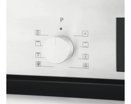 Detailný záber otočného gombíka na rúre na nastavenie rôznych funkcií varenia