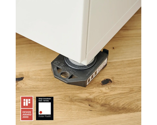 Nábytkový klzák pod kusom nábytku na drevenej podlahe. Logo iF Design Award. Logo Red Dot.