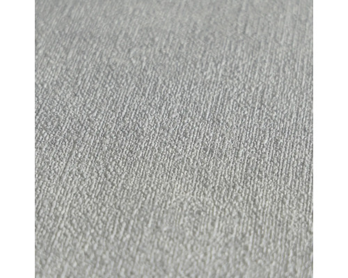 Detail bielej štruktúrovanej tapety