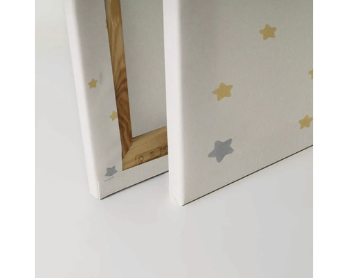 Dva obrazy na plátne so vzorom hviezd a dreveným rámom