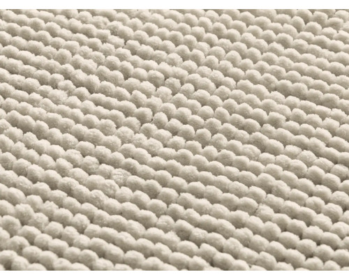 Detailný pohľad na kúpeľňovú predložku z bavlny s nopkovou štruktúrou