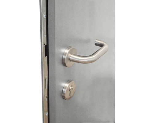 Detail dverí s kľučkou a zámkom