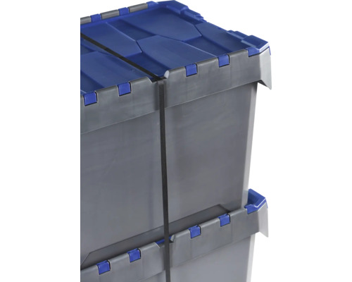 Dva sivé plastové boxy s modrým vekom a upínacím popruhom naskladané na sebe