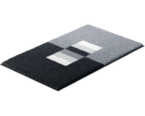 Rohožka s geometrickým vzorom v rôznych odtieňoch šedej