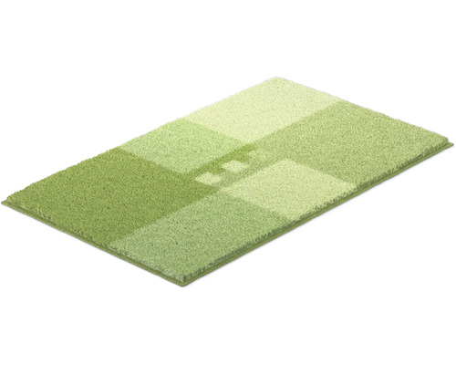 Zelený koberec s geometrickým vzorom