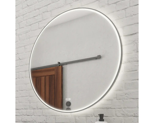 Okrúhle LED zrkadlo do kúpeľne s dotykovým senzorom na tehlovej stene