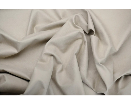 Detail béžovej látky so záhybmi