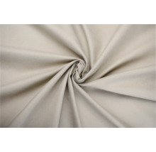 Béžová látka v stočenom prevedení