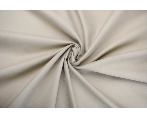 Béžová látka v stočenom prevedení