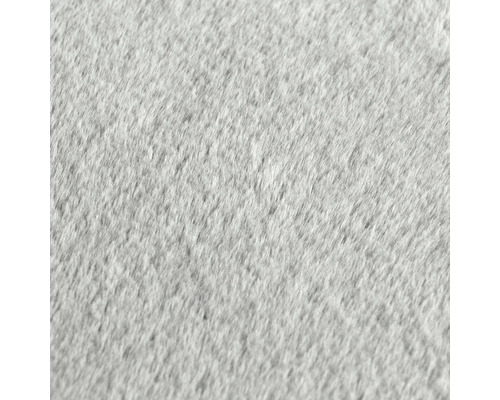 Detail šedého povrchu koberca