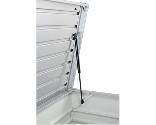 Detailný pohľad na otvorený úložný box s plynovou pružinou