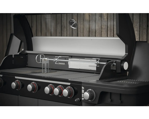 Plynový gril s funkciou otočného ražňa a niekoľkými regulátormi.