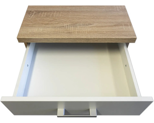 Otvorená zásuvka s dreveným dekorom a bielym predným panelom.